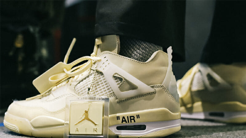 Off-White x Nike Air Jordan 4 Sail On Foot Side 1