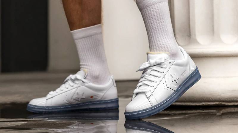 https://cms-cdn.thesolesupplier.co.uk/2020/07/ROKIT-x-Converse-Pro-Leather-Low-Top-White-On-Foot.jpg
