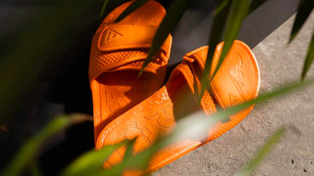The Pharrell Williams x adidas Boost Slides Get Unveiled The Pharrell Williams x adidas Boost Slides Get Unveiled