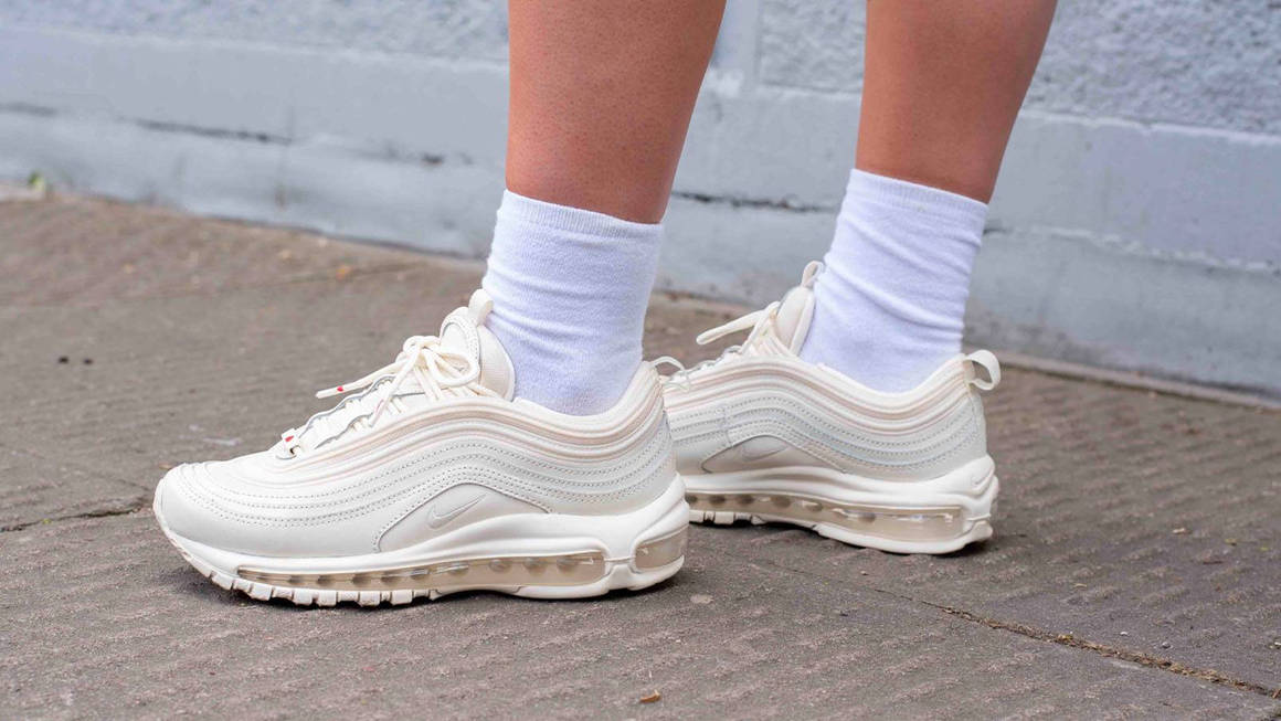 white nike air max 97 on feet