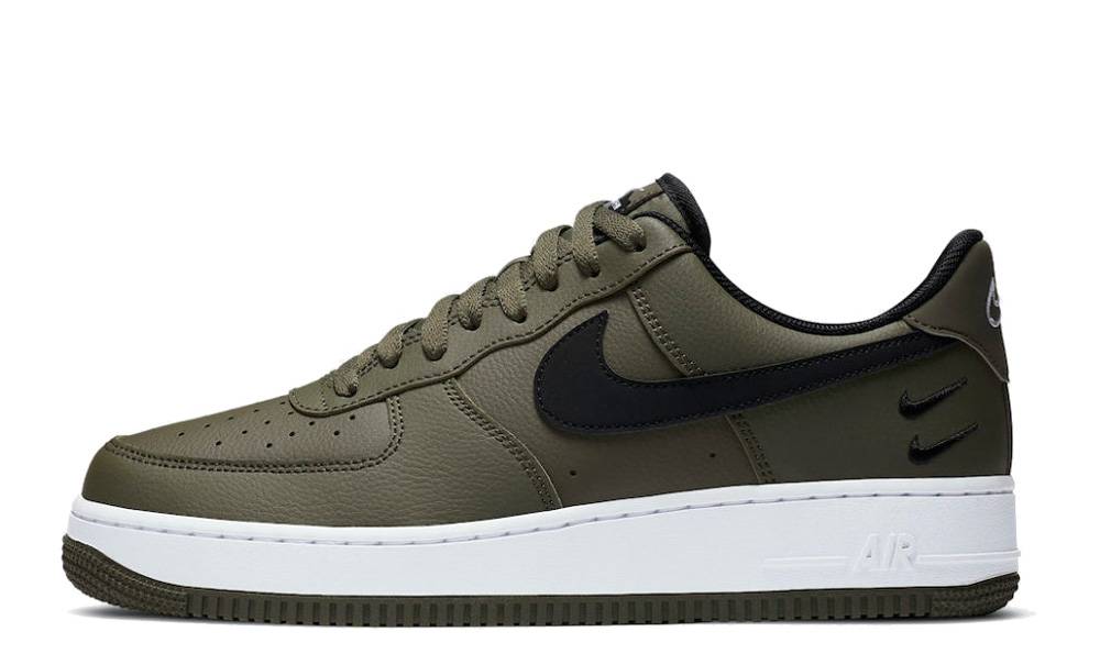 nike air force one with black swoosh