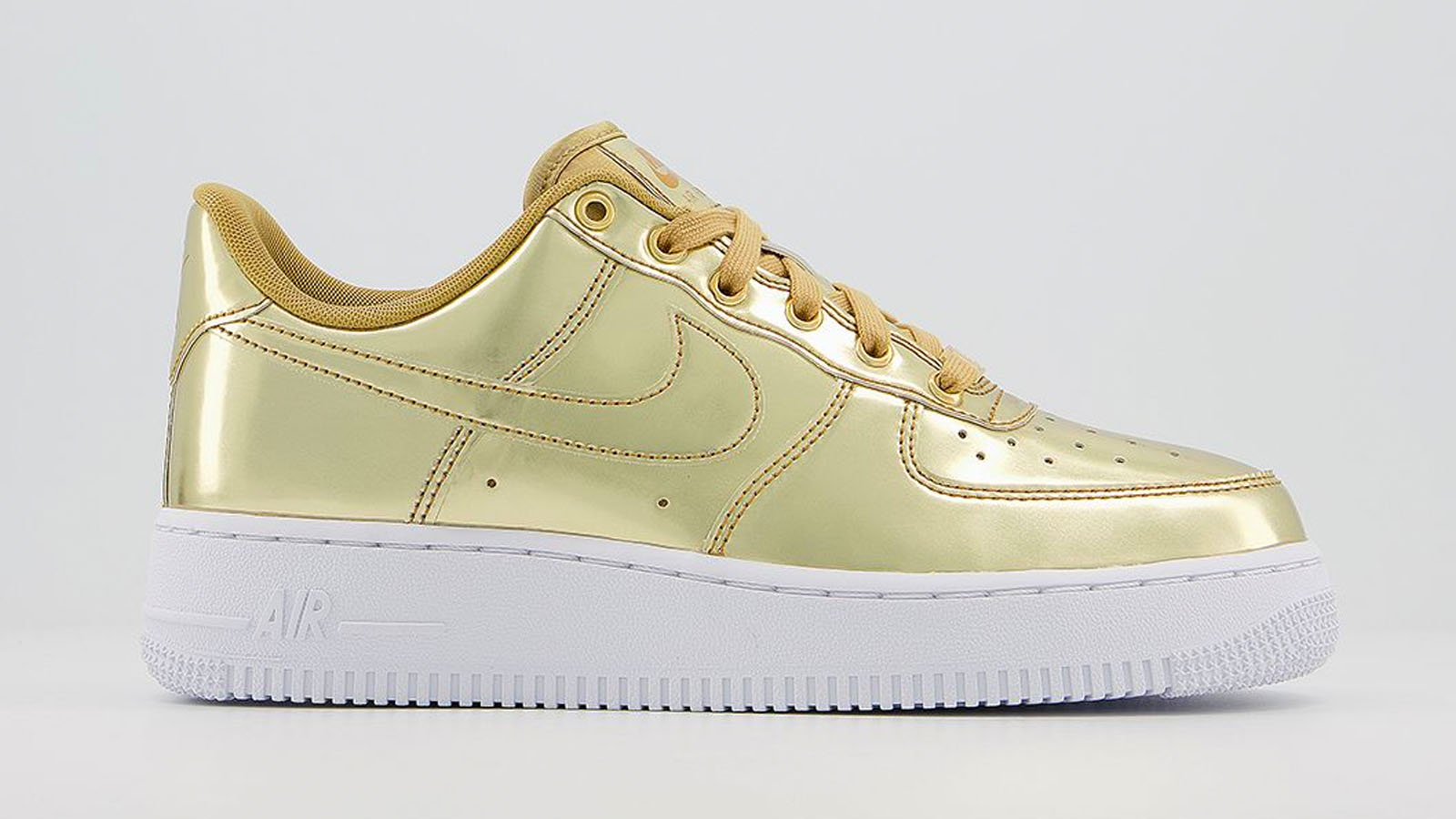 gold nike air force 1