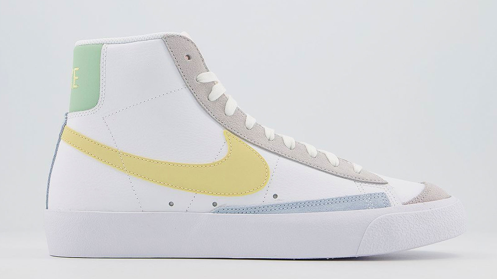 green yellow blue nike blazer mid