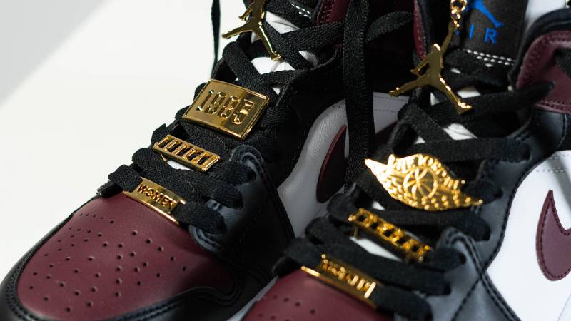 gold and maroon jordans