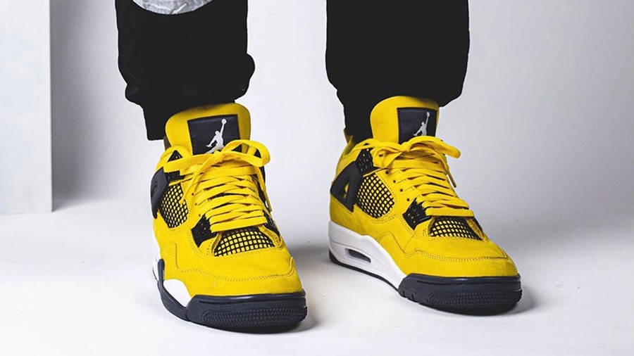 air jordan 4 tour yellow on feet