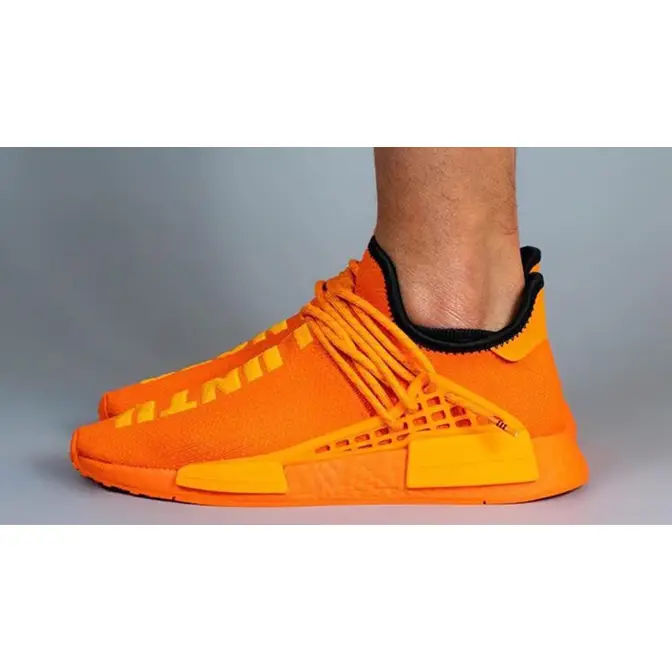Pharrell x adidas NMD Hu Bright Orange On Foot Side
