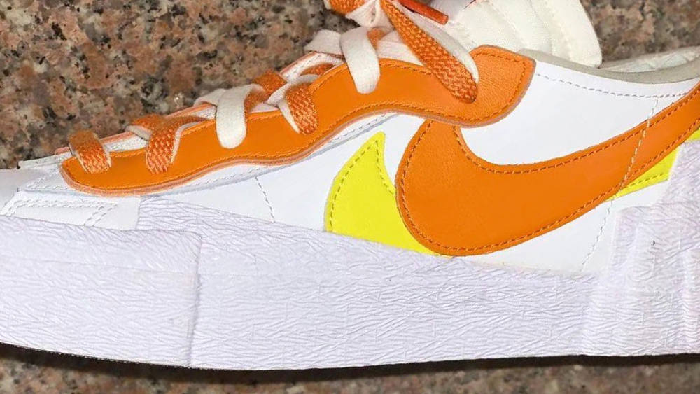 Image via solebyjc Up Close With the sacai x Nike Blazer Low "Magma Orange"
