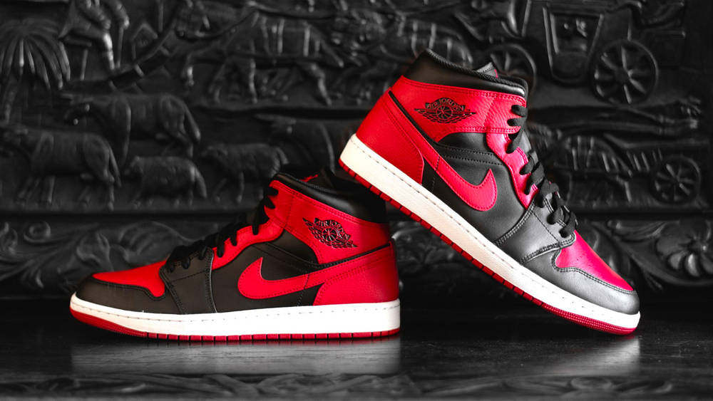 Image via The Sole Supplier The Air Jordan 1 Mid "Banned" Just Got a Major Restock!
