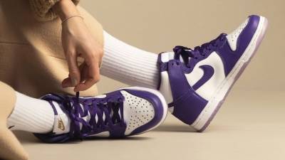 varsity purple dunks on feet