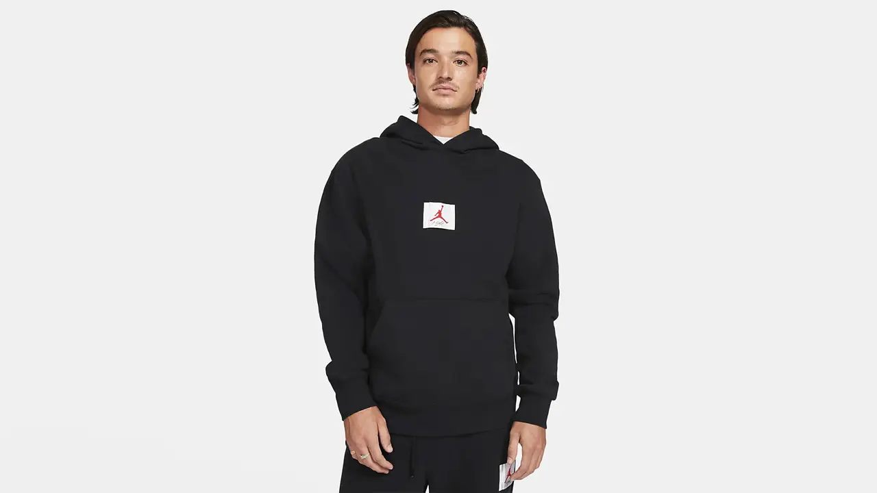 Fear of god essentials graphic pullover hoodie on sale black