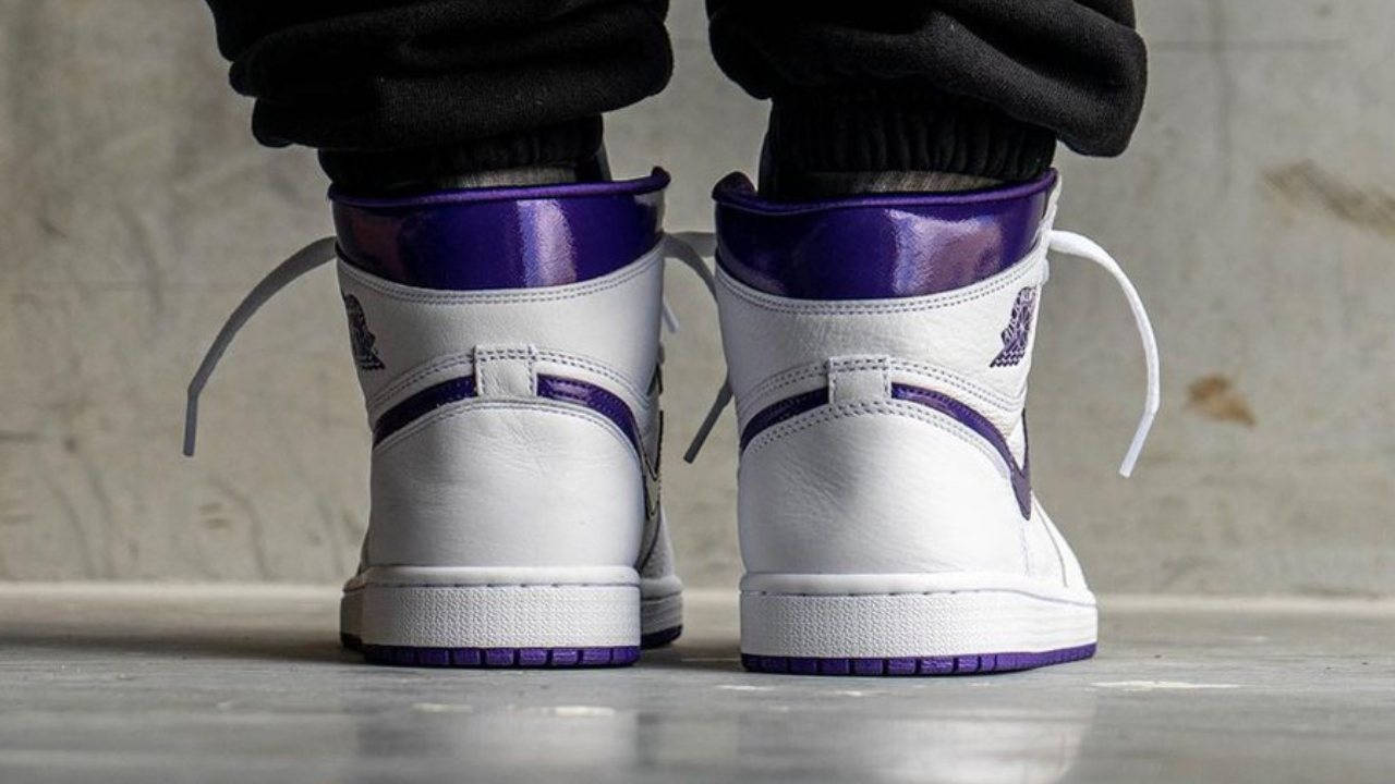 metallic purple jordan 1 on feet