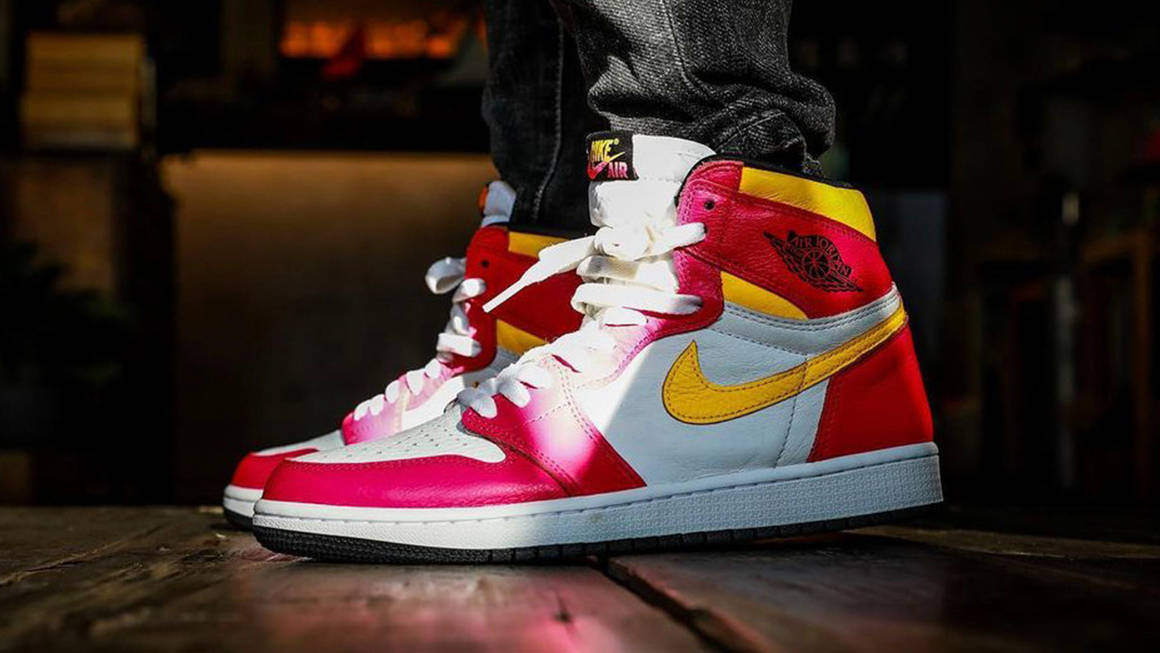 jordan 1 retro high og light fusion red on feet