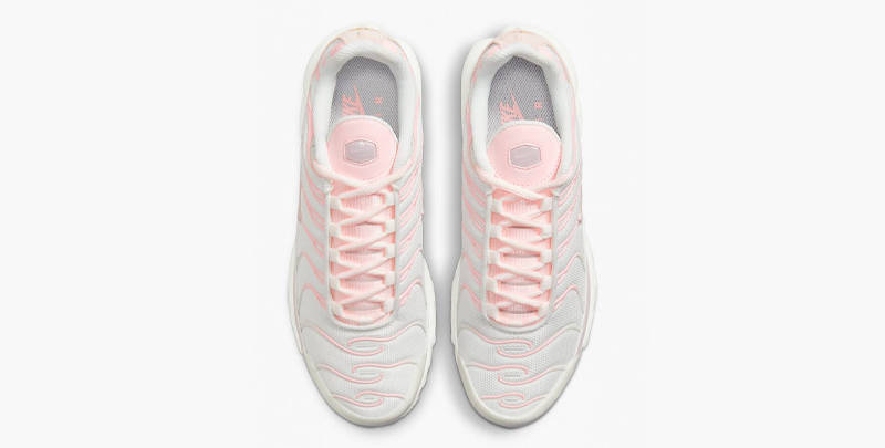 white and pink nike tns