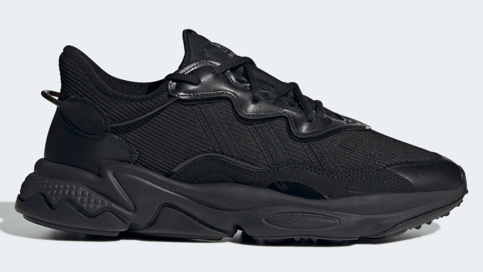 adidas ozweego triple black 25 off sale