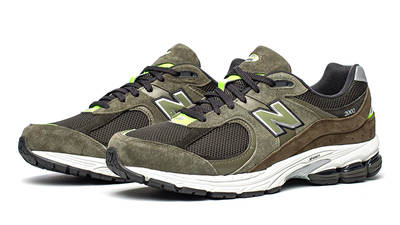 new balance gris gold