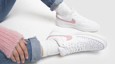 white and pink court vision trainers