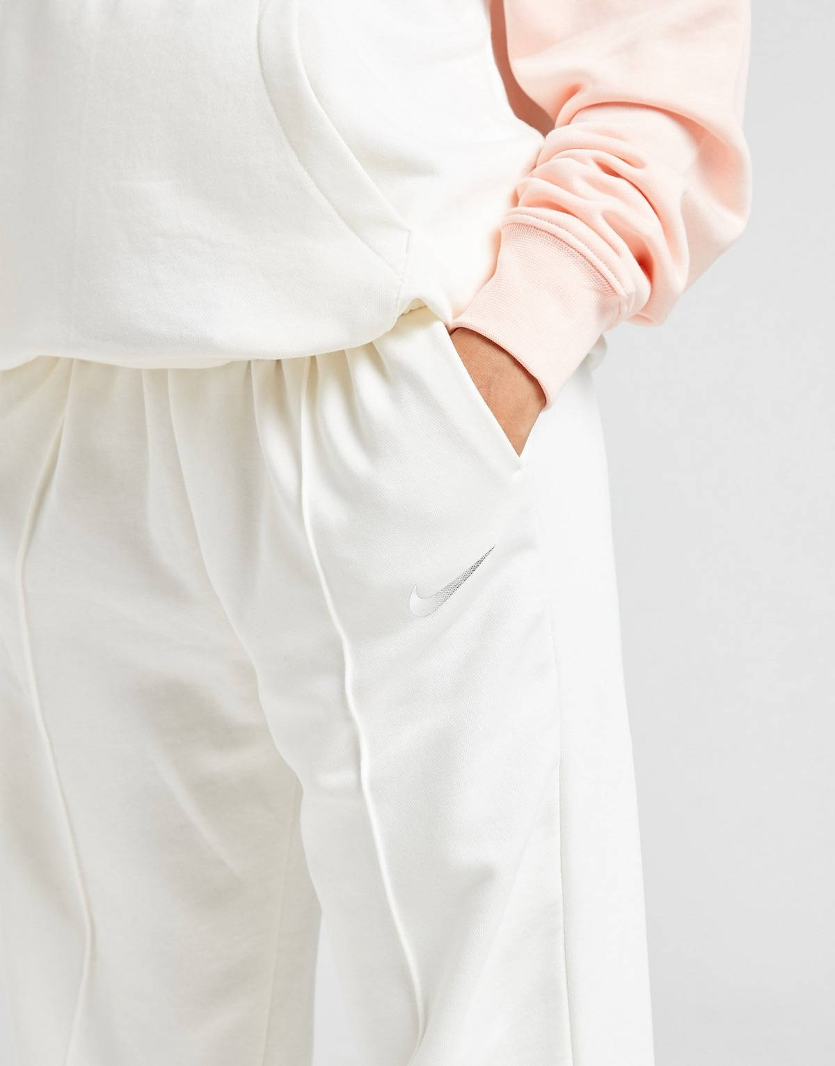 white nike swoosh tracksuit