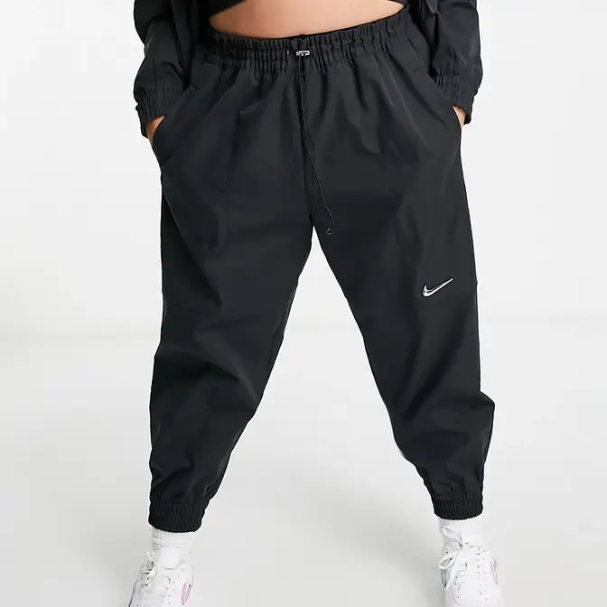 Nike store swoosh bottoms