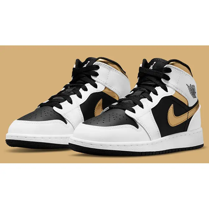 Black white and gold hotsell jordan ones