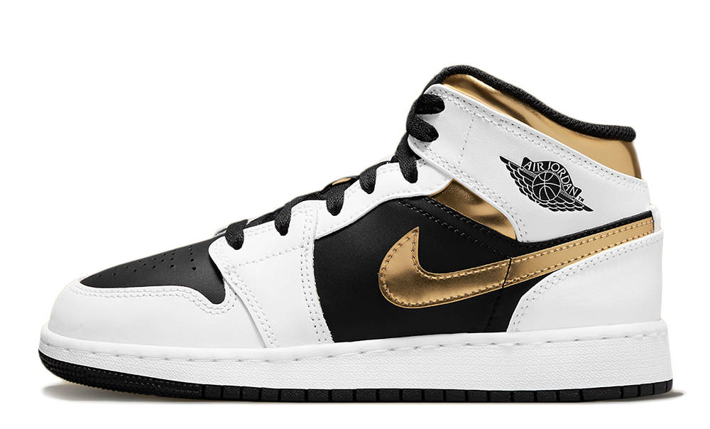 gold and white jordan shoes