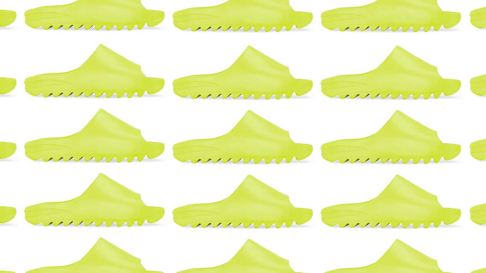 Image via Yeezy Mafia Yeezy Slide "Glow Green"