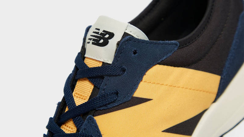 New Balance 327 Navy Yellow Closeup
