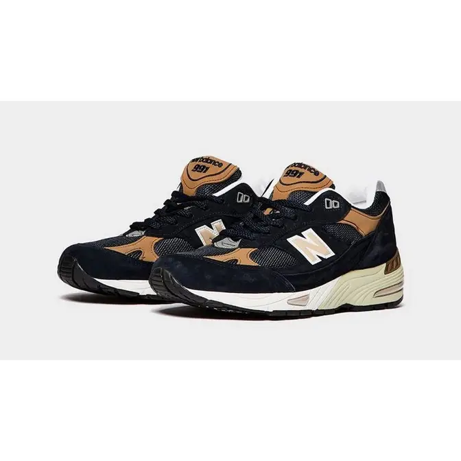 New balance 991 black best sale with tan