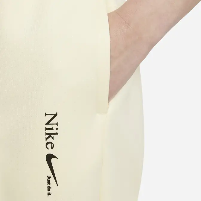 Nike Sportswear Motto Logo Trousers | Where To Buy | DO0781-113 | The ...