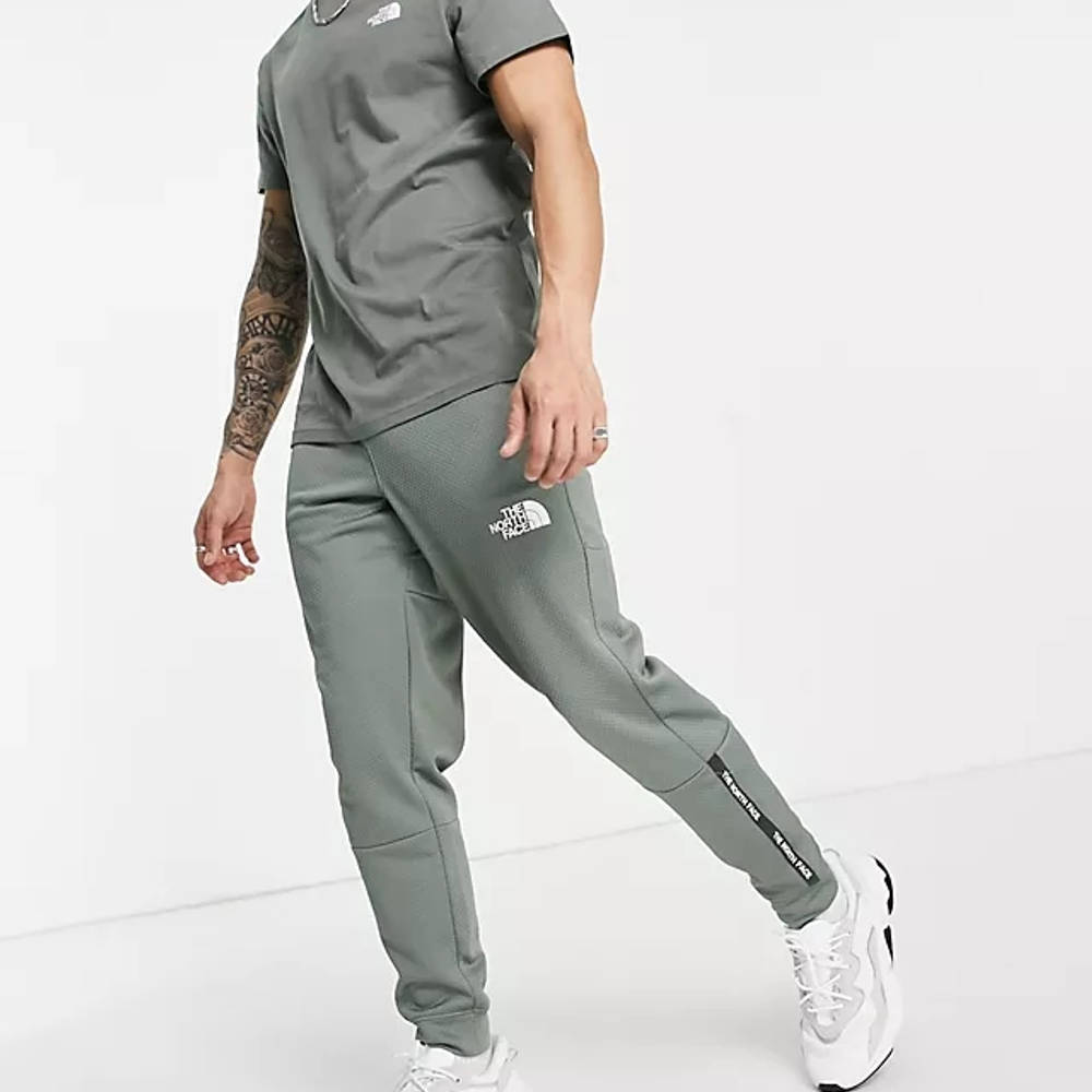 the north face mountain athletic joggers in black