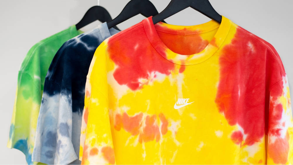 Image via The Sole Supplier Add Some Colour Back Into Your Fits With These Nike Premium Essentials Tie Dye T-shirts