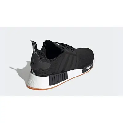 Adidas nmd black gum bottom sale