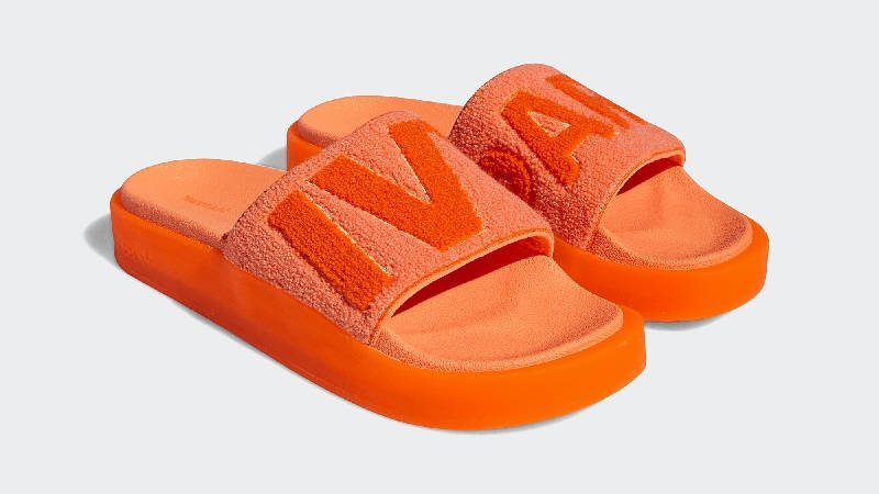 Orange adidas store slides