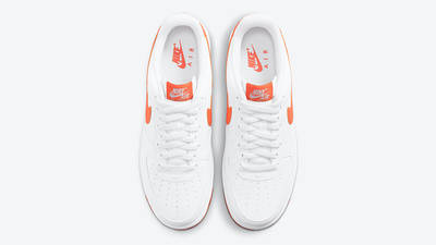 white nike orange tick