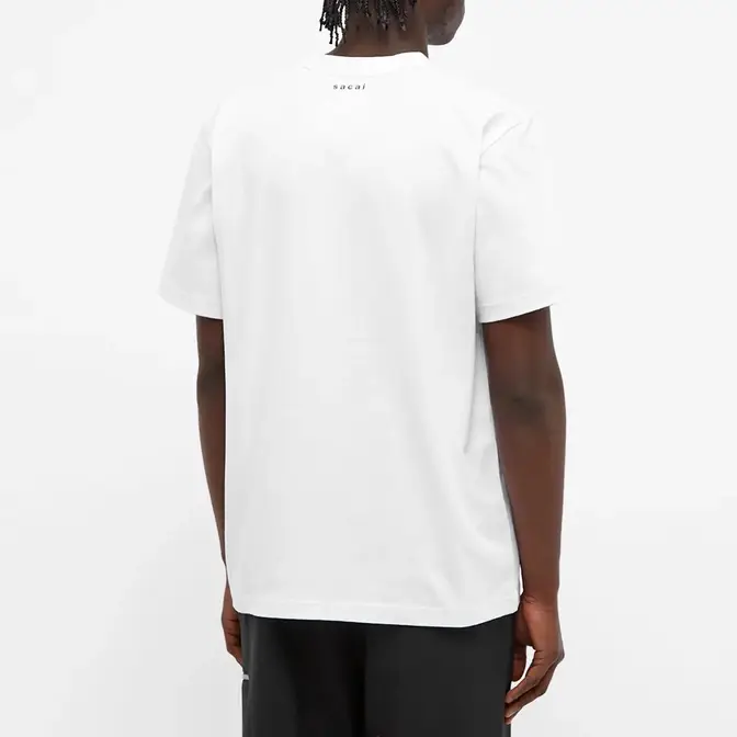 sacai x kaws shirt