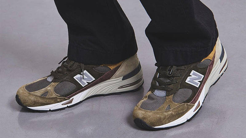 United Arrows x New Balance 991 Green Camo on foot