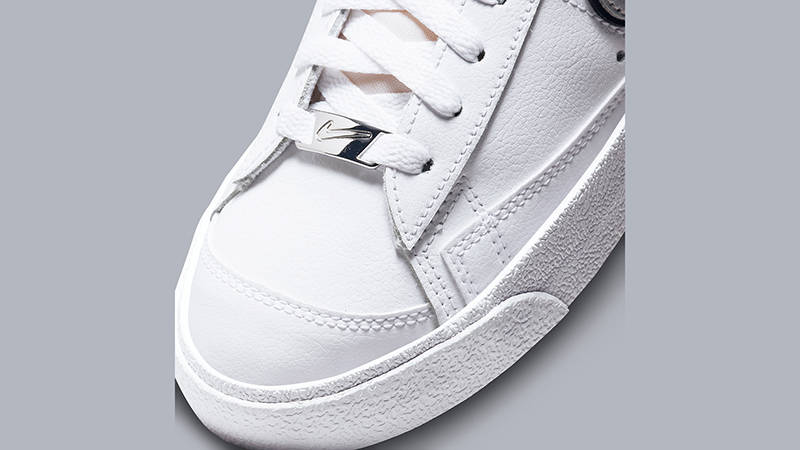 nike shoes with metallic swoosh