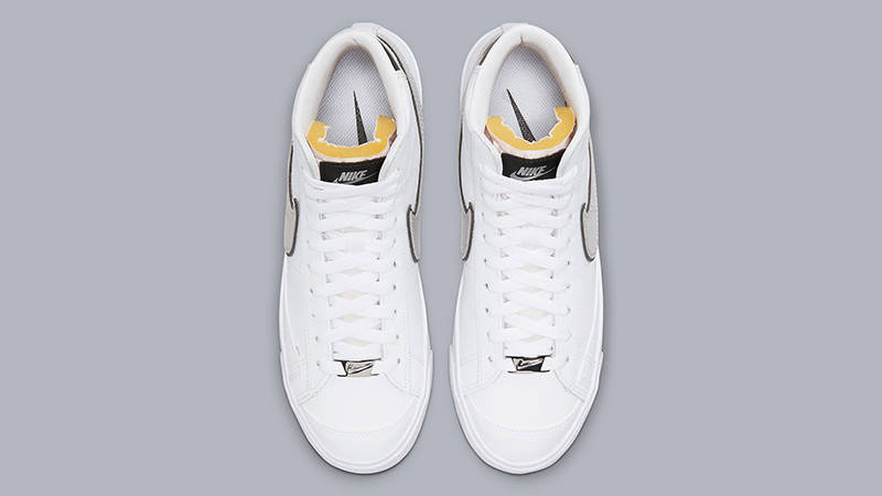 nike shoes with metallic swoosh