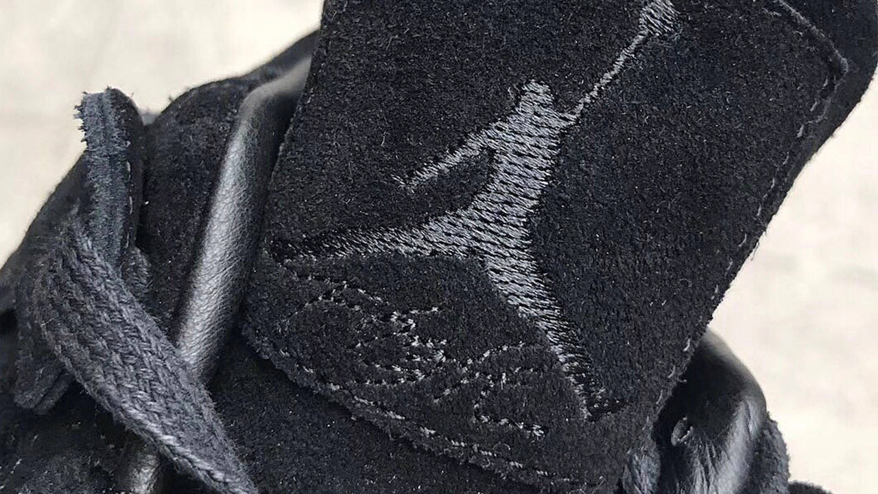 KAWS x Air Jordan 4 "Looksee"