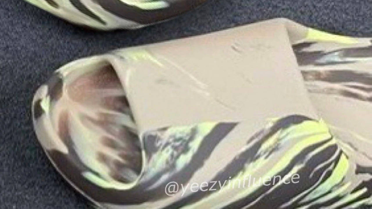 This Yeezy Slide MX Is Giving Us Serious "Zebra" Vibes
