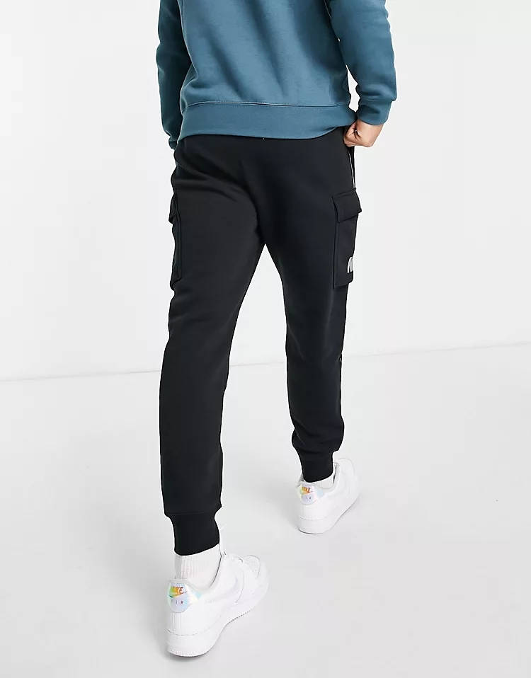 nike taped joggers black