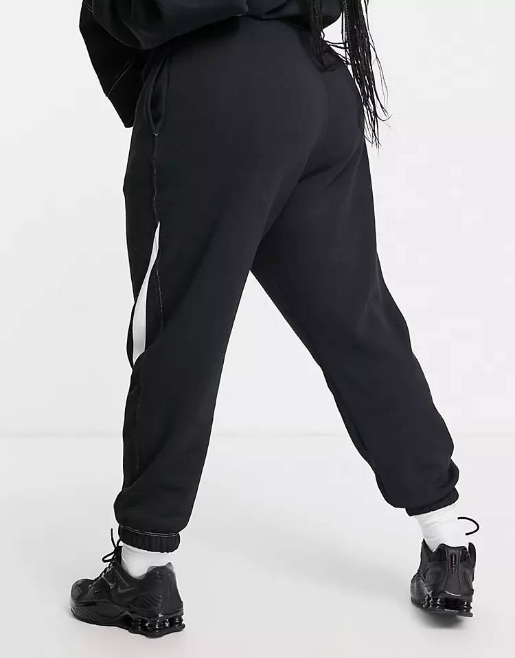 nike plus swoosh fleece pants