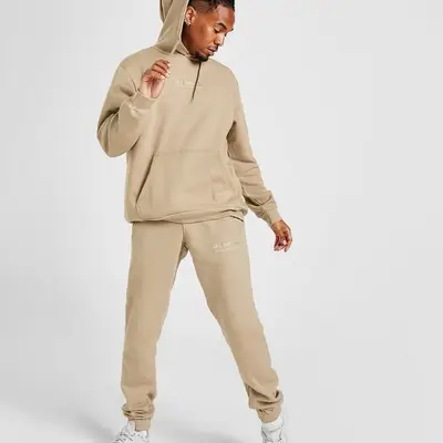 Beige adidas sale tracksuit mens