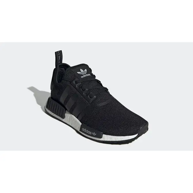 Nmd r1 on sale triple black reflective