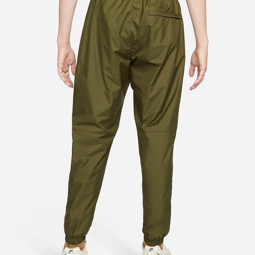 Nike Sportswear Swoosh League Woven Lined Trousers Rough Green The Sole Supplier