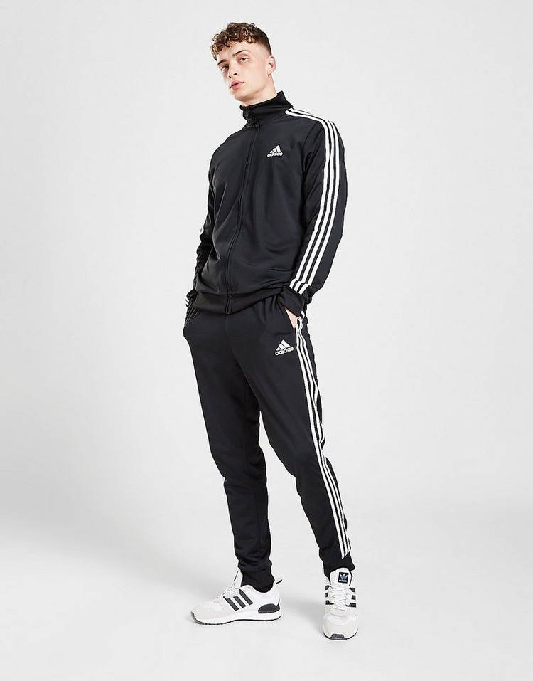 Adidas tracksuit black with best sale green stripes