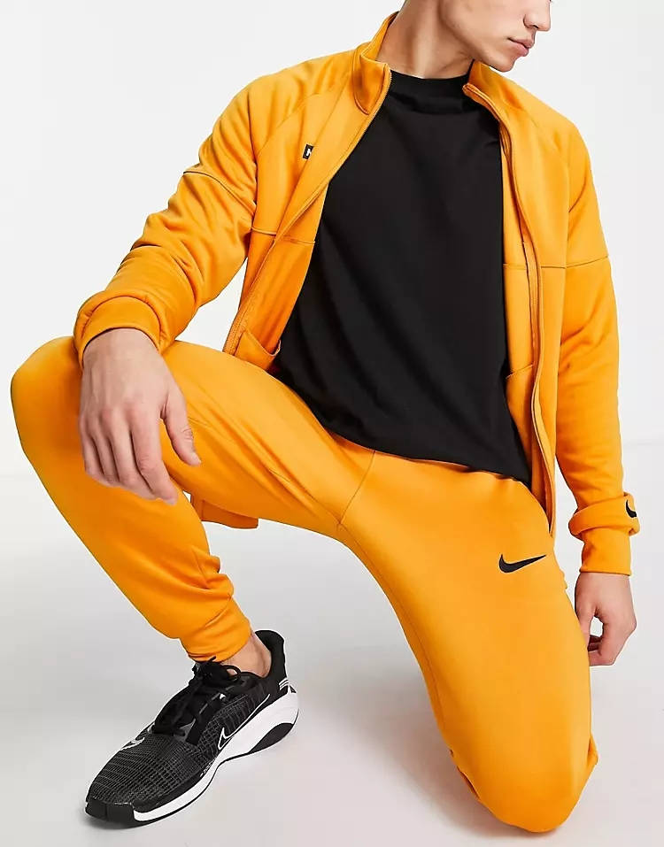 yellow nike tracksuit
