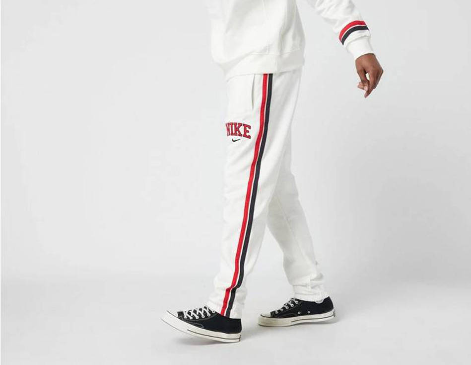 white and red nike joggers