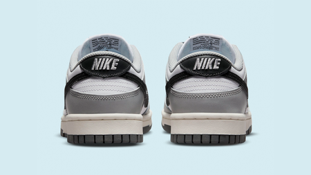 The Dunk Low "Light Smoke Grey" Receives Nike's Vintage Touch The Dunk Low "Light Smoke Grey" Receives Nike's Vintage Touch