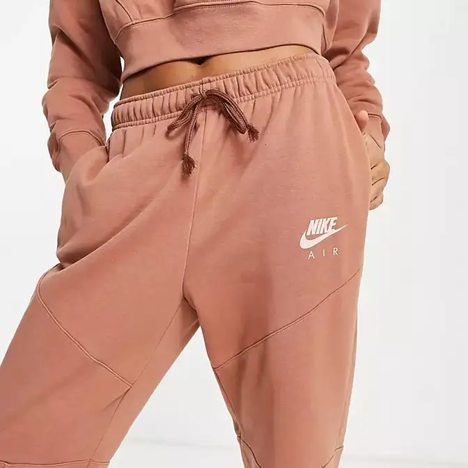 Rose gold clearance nike joggers