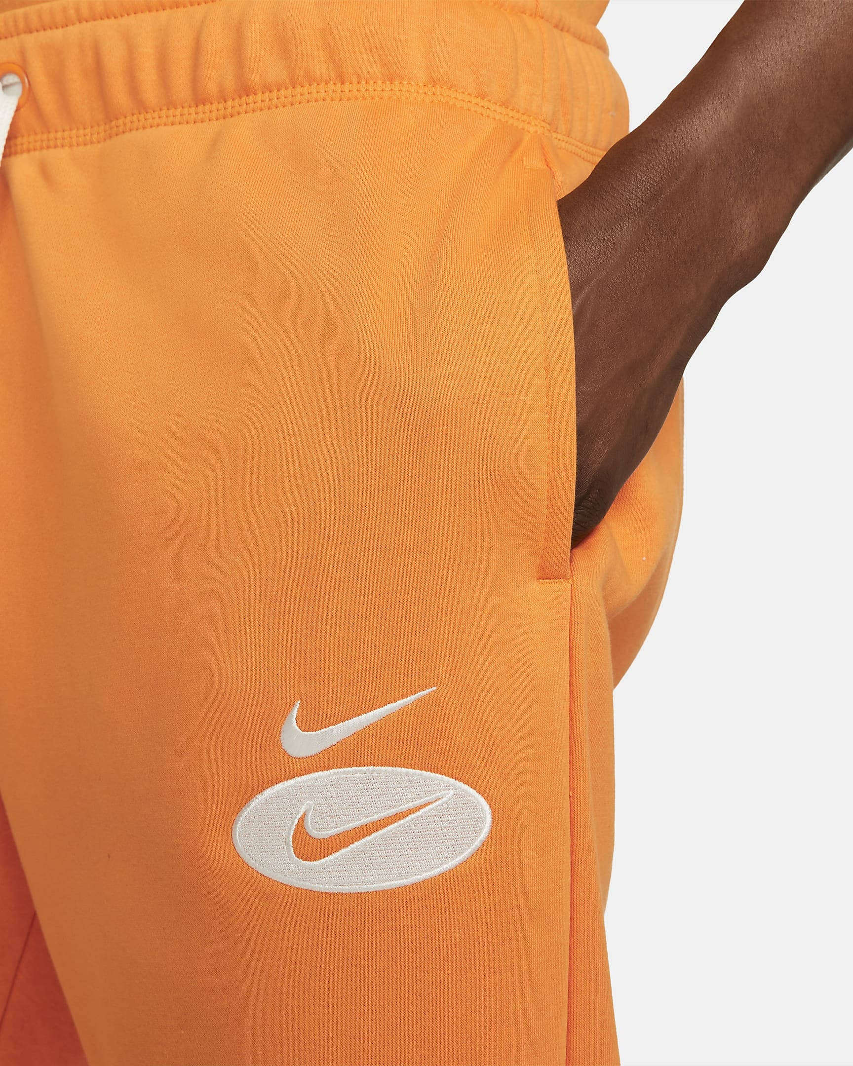 Nike double swoosh online joggers orange